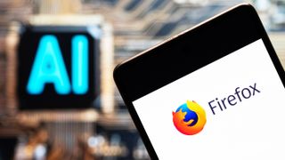 CHINA - 2023/11/03: In this photo illustration, the open-source web browser developed by Mozilla Foundation, Firefox logo seen displayed on a smartphone with an Artificial intelligence (AI) chip and symbol in the background. (Photo Illustration by Budrul Chukrut/SOPA Images/LightRocket via Getty Images)