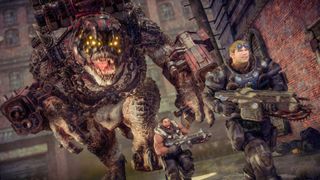 A screenshot from Gears of War: Reloaded showing two soldiers running from a large armored creature.