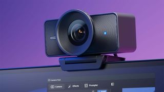 Elgato Facecam 4K on top of a monitor with Camera hub displayed on the screen. 