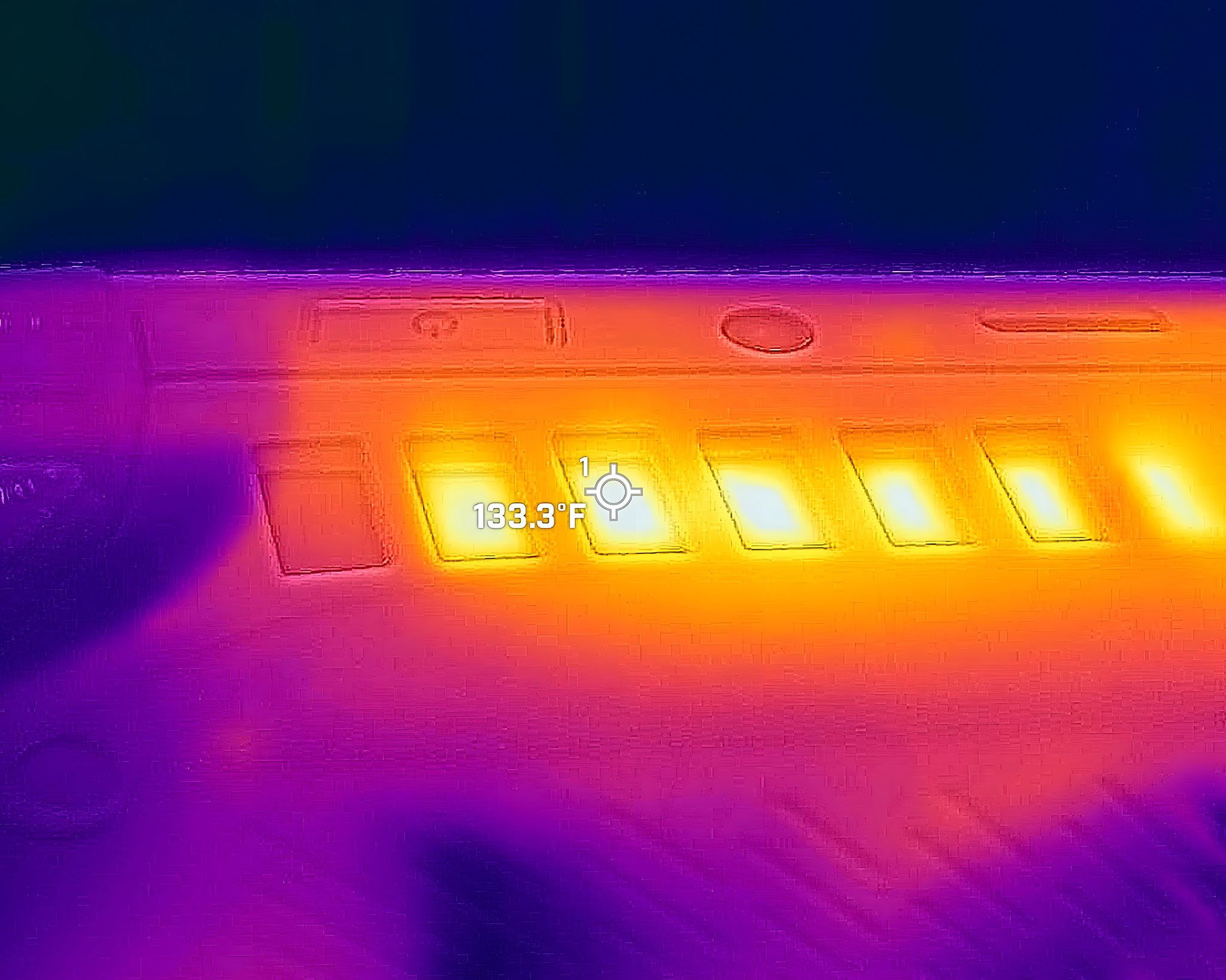 A picture taken with a thermal camera showing the Xbox Ally's vents reach 133 degrees F. 