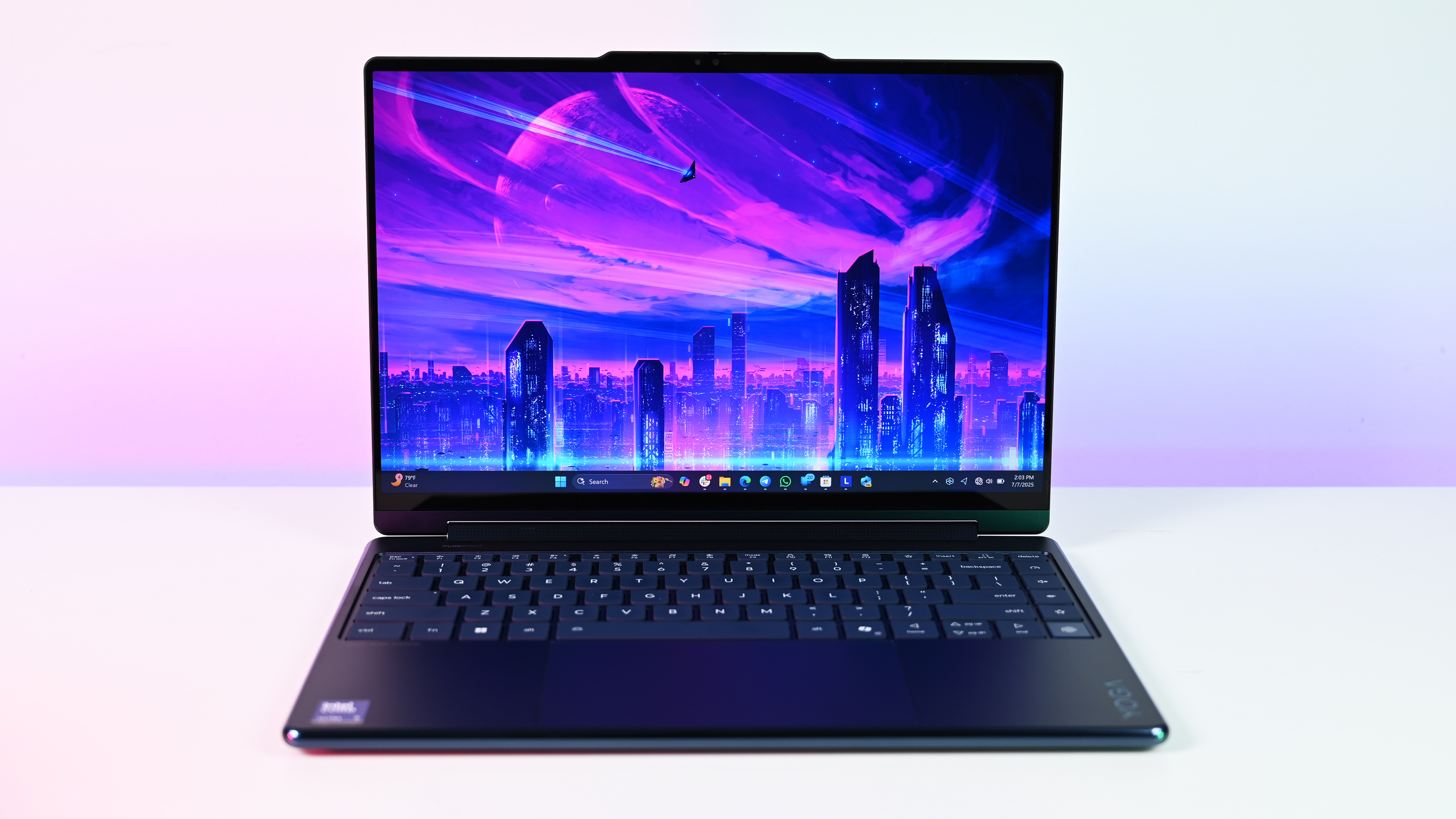 Photos of the Lenovo Yoga 9i 2-in-1 (2025) Intel Aura Edition 14-inch laptop. 