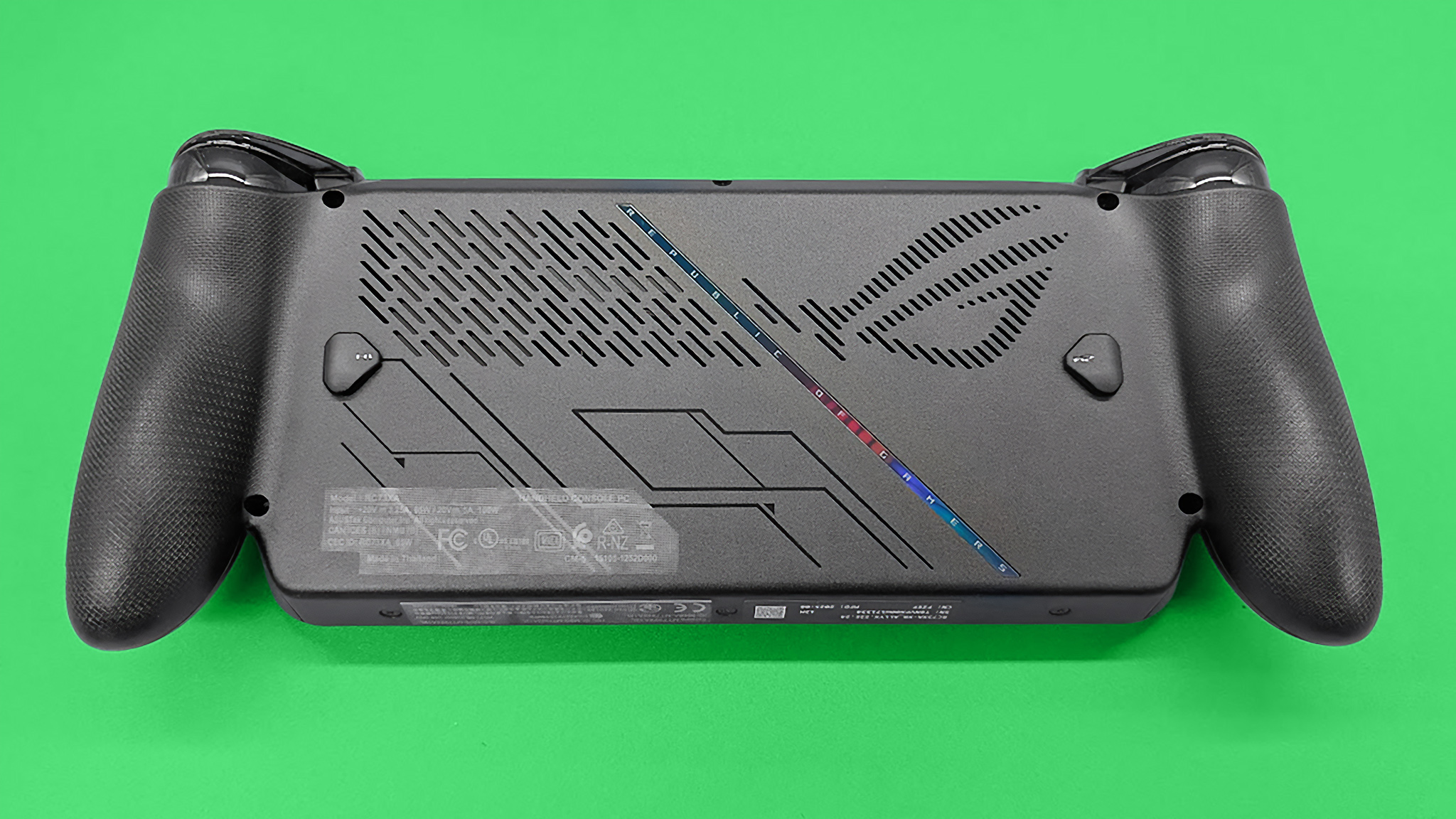 The ROG Xbox Ally X layiung face down.